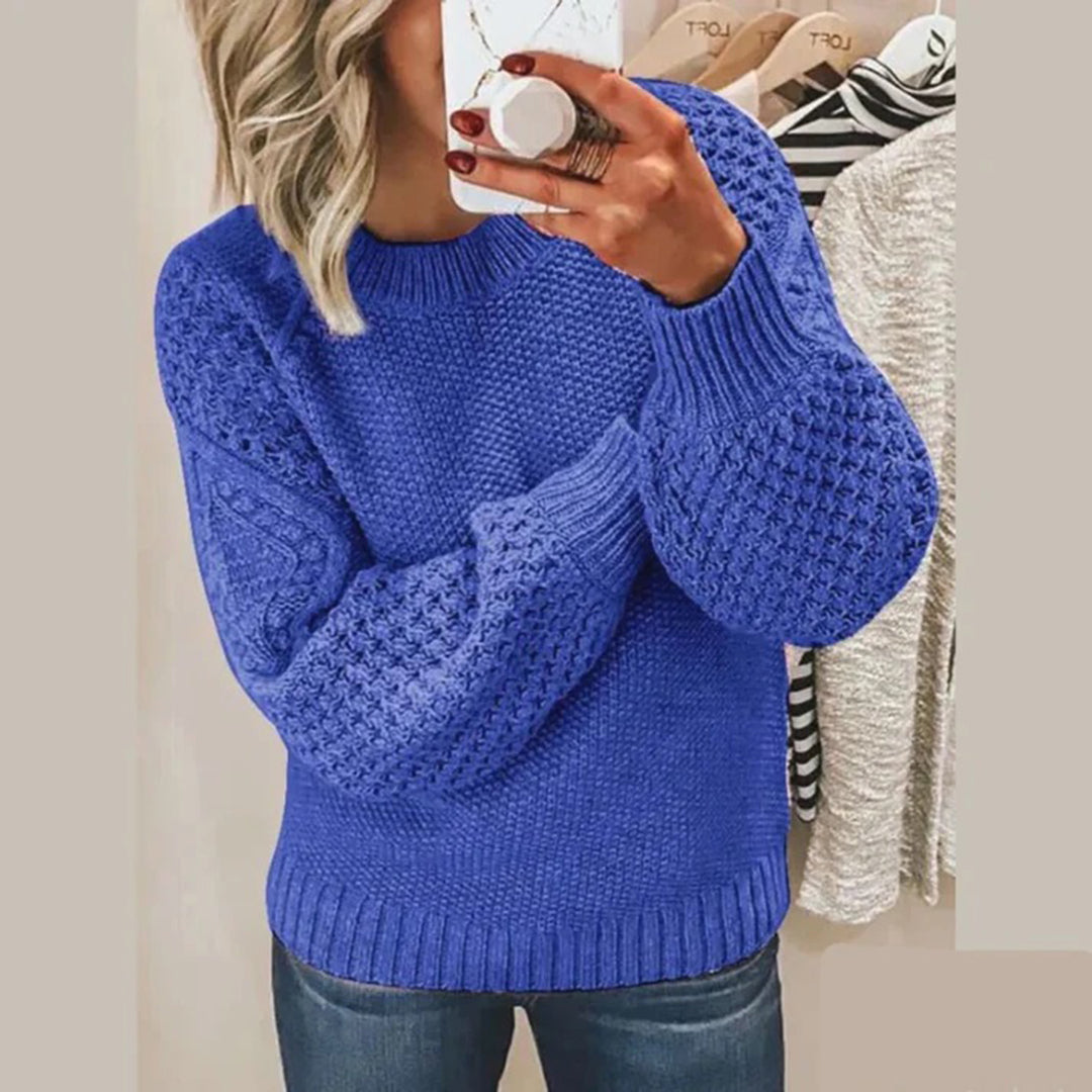 Women's chunky knit sweater relaxed fit with voluminous sleeves and ribbed edges cozy style