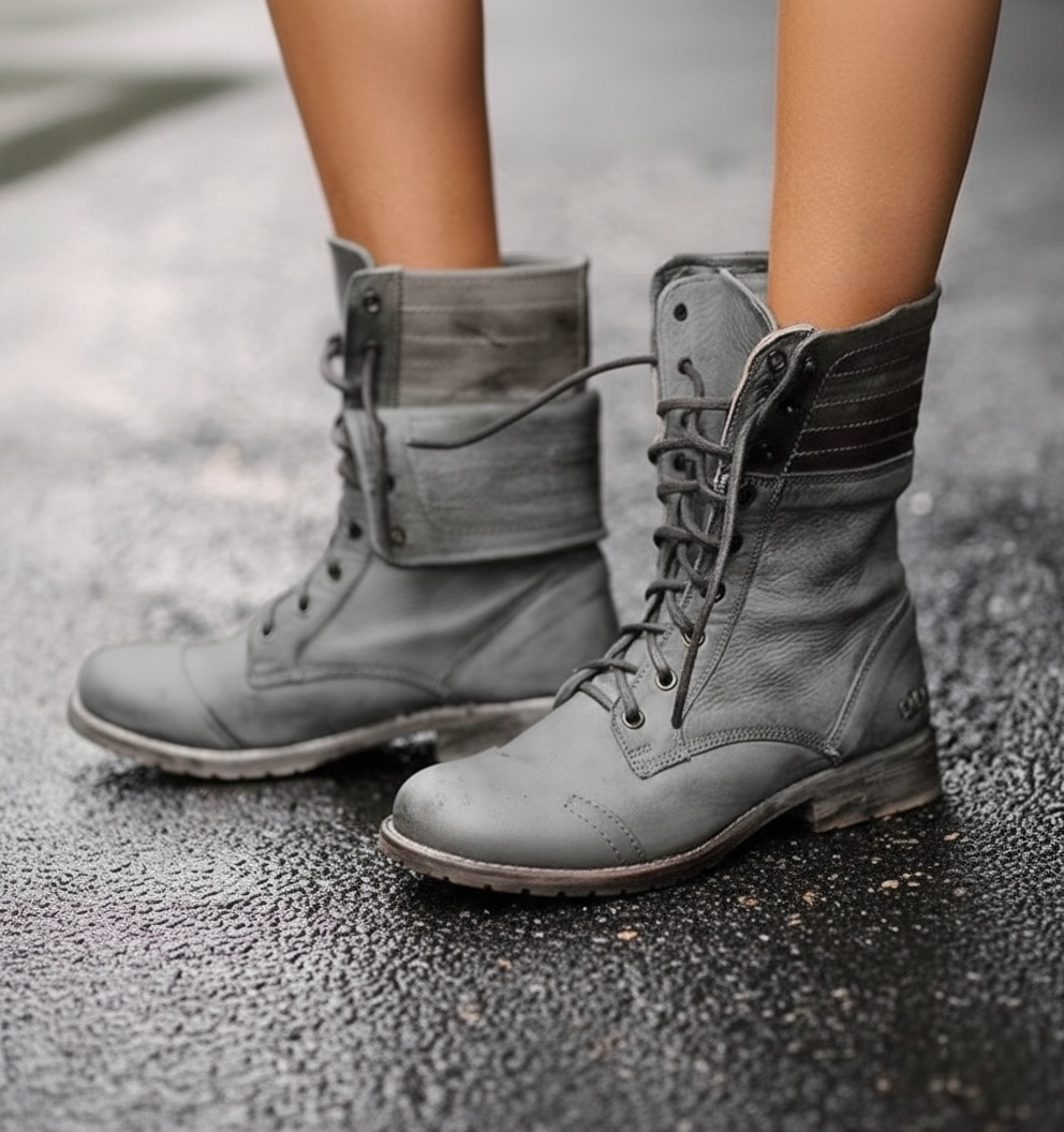 Women's vintage lace-up boots in brown leather mid-calf cut with classic eyelets and stacked heel