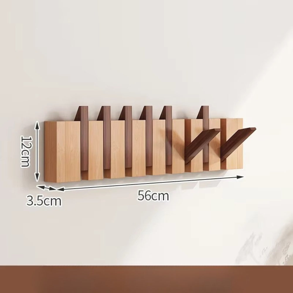Modern wooden wall-mounted flip hook rack with foldable hooks, minimalist entryway organizer