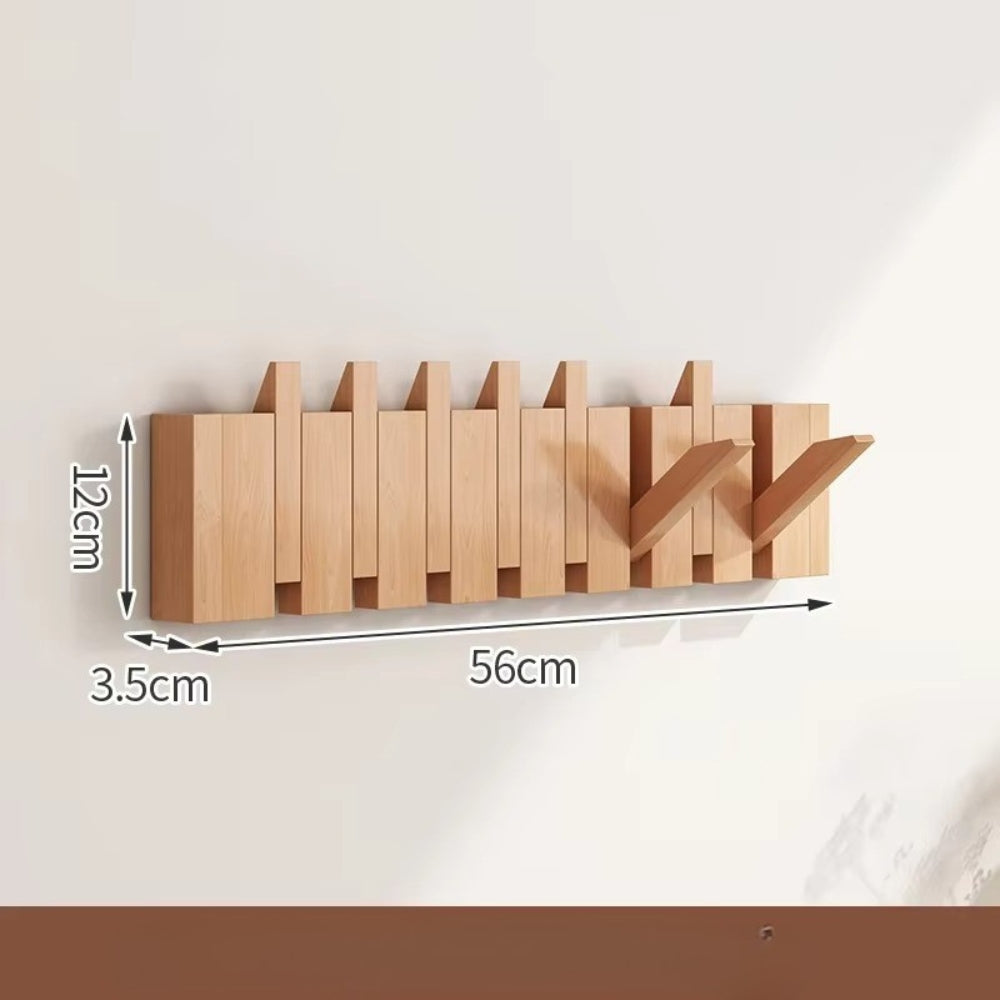 Modern wooden wall-mounted flip hook rack with foldable hooks, minimalist entryway organizer, natural wood finish