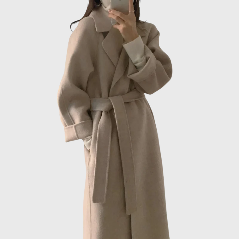 Beige tailored belted overcoat with streamlined silhouette and premium soft fabric blend