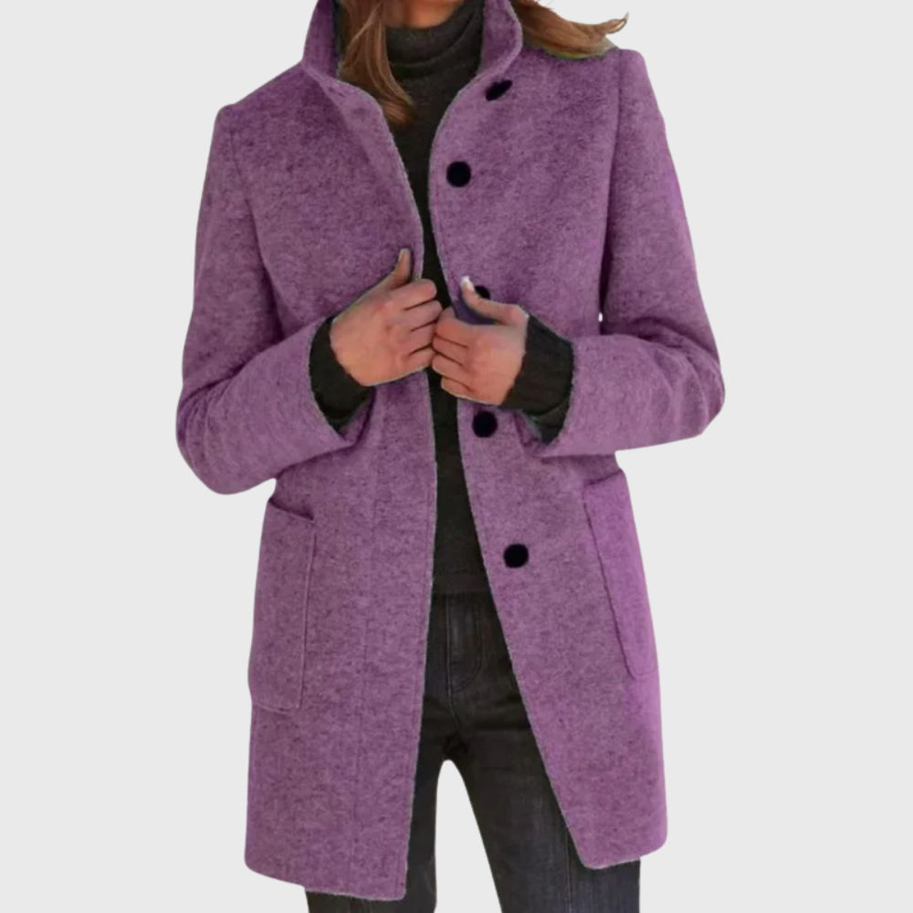 Beige tailored overcoat with streamlined silhouette and elongating flattering fit