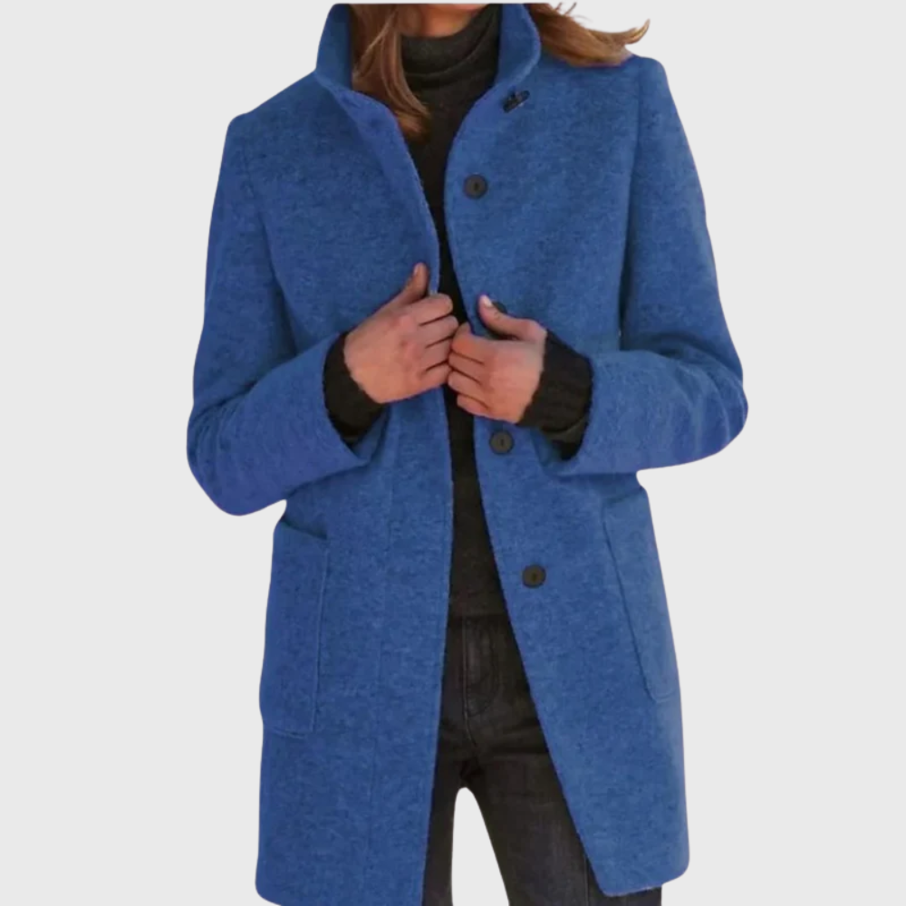 Women's beige tailored overcoat with streamlined silhouette and classic elongating flattering fit