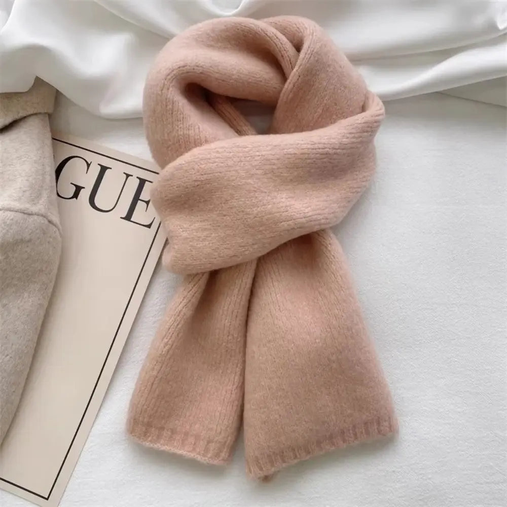 Chloé soft wool winter scarf in rich rust terracotta, elegant knit design for cozy cold-weather warmth