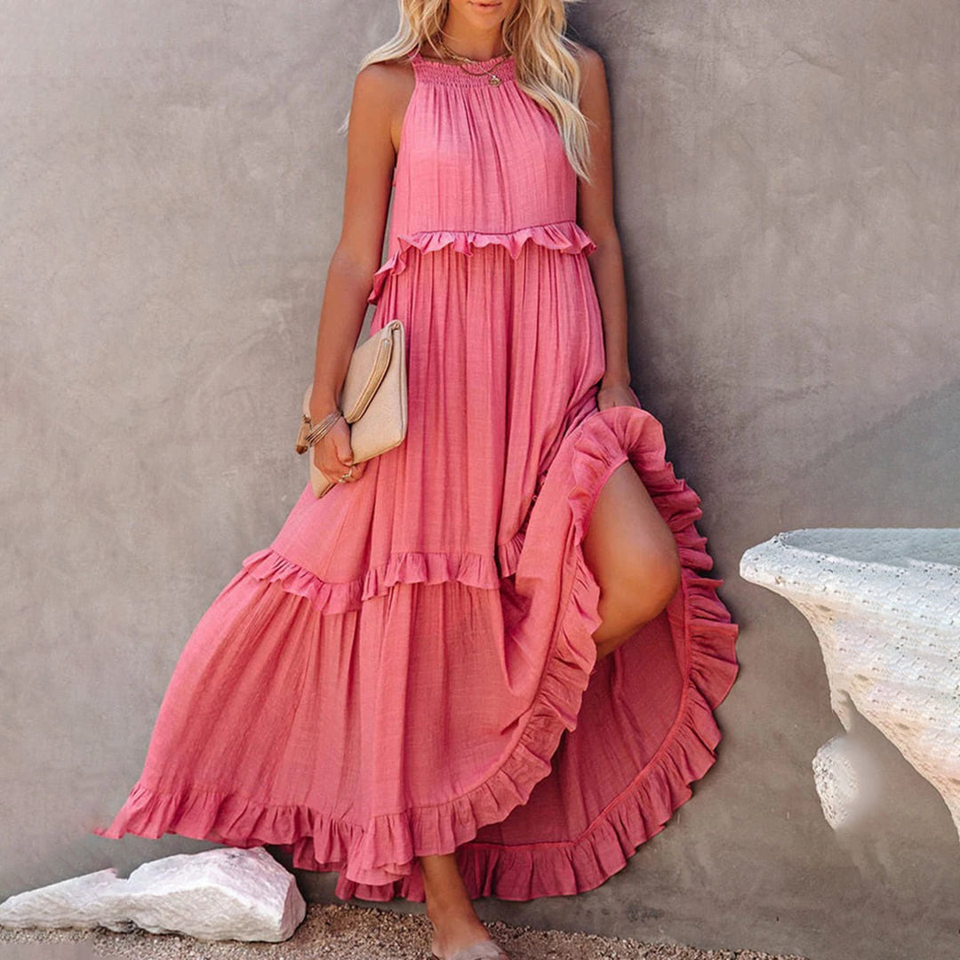Women's sleeveless halterneck maxi dress, light A-line silhouette with airy feminine drape for summer