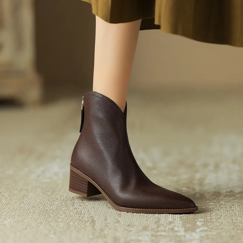 Women's pointed-toe ankle boots with block heel, chic silhouette in classic versatile style