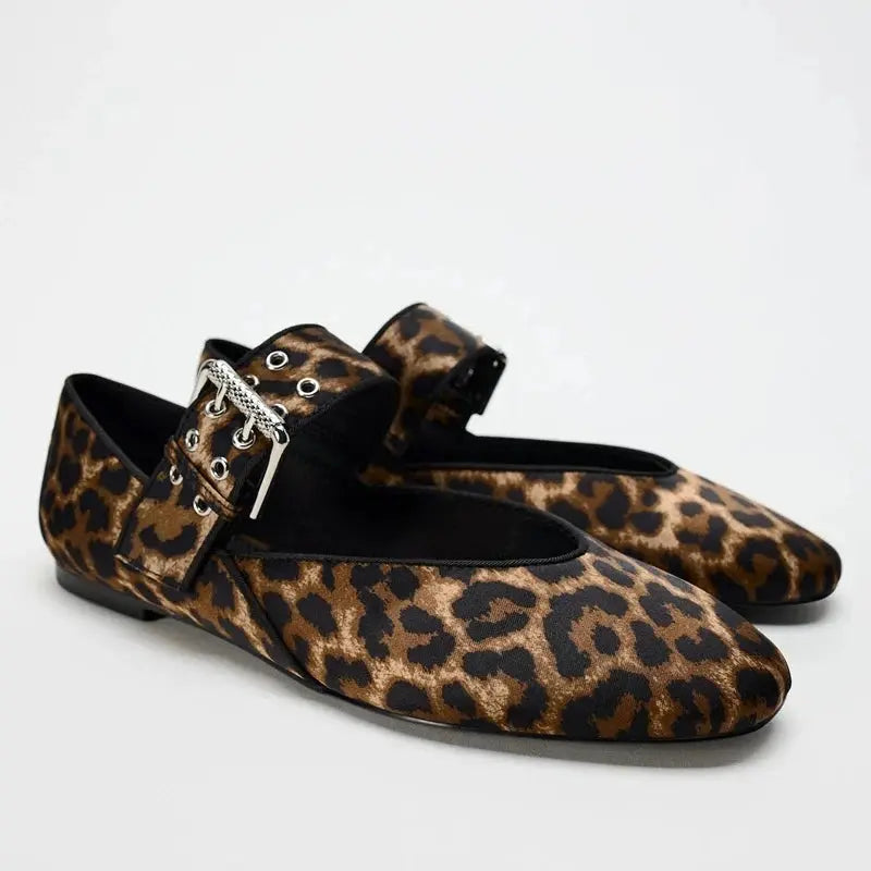 Women's pointed toe flats in bold leopard print, sleek silhouette with leg-elongating design