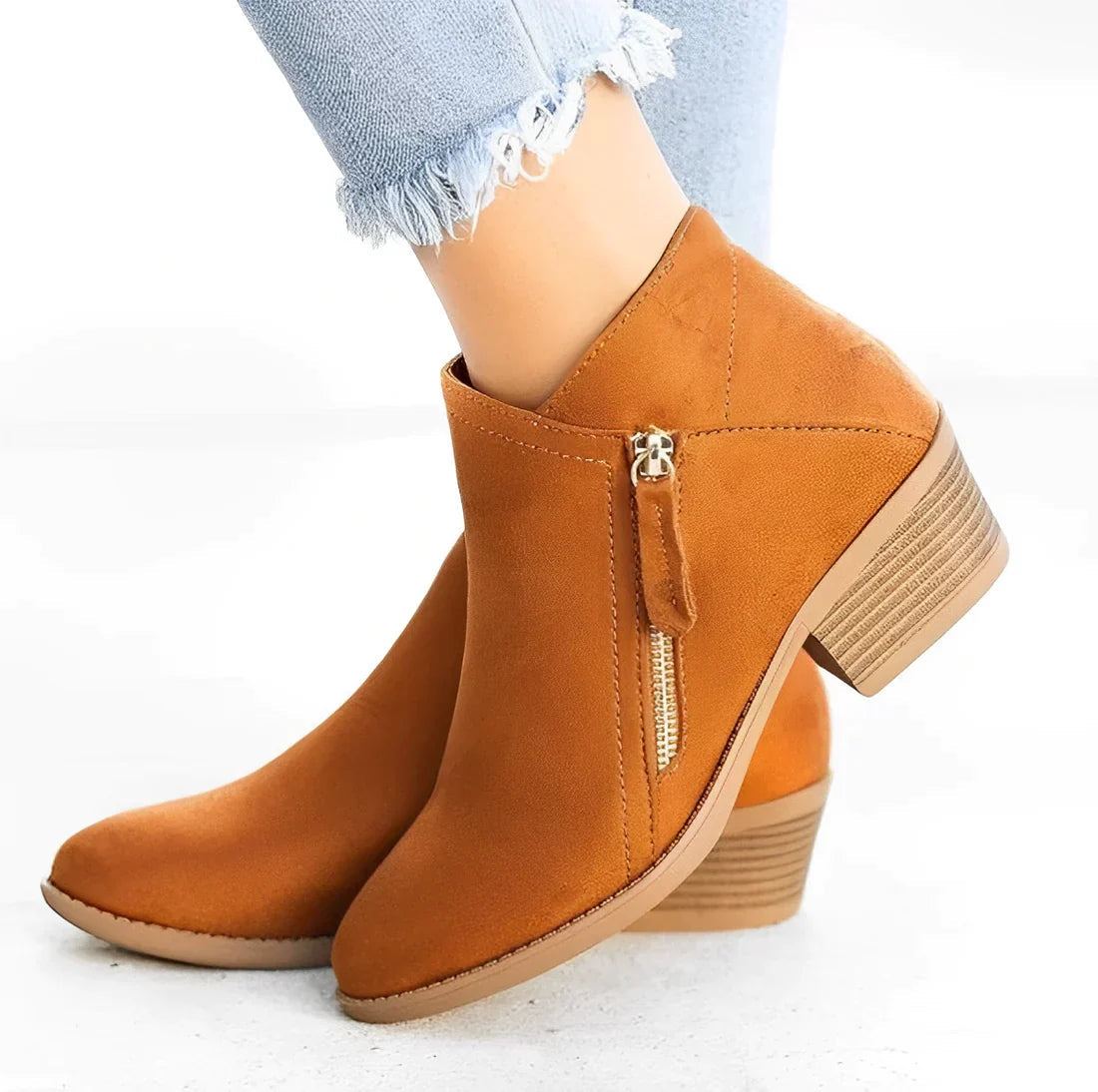 Women's pointed toe short boots in classic style with medium block heel, sleek autumn-winter silhouette