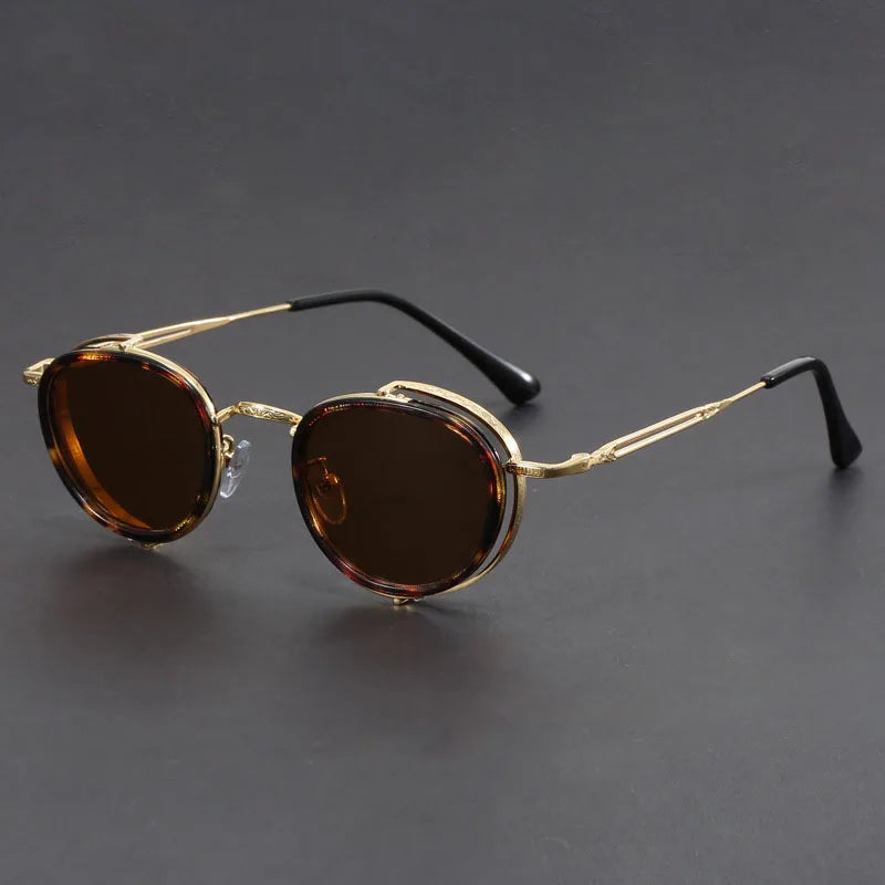 Porto Noir matte black round metal sunglasses with UV400 lenses and minimalist retro-industrial style