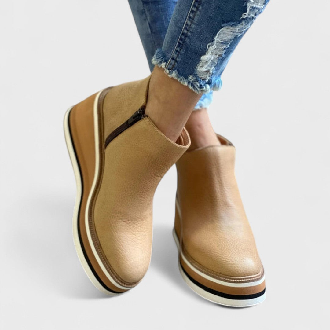 Elegant waterproof women's shoes in neutral tone with polished silhouette and all-day comfort sole