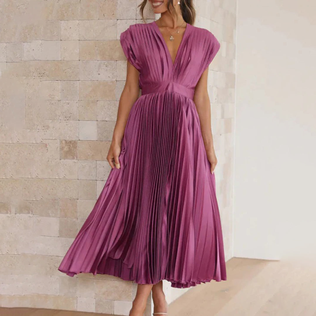 Maren women's wedding guest dress in elegant silhouette with soft flowing fabric and refined feminine cut