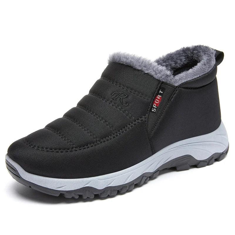 Women's quilted waterproof slip-on winter ankle boots in neutral tones with cozy insulated design