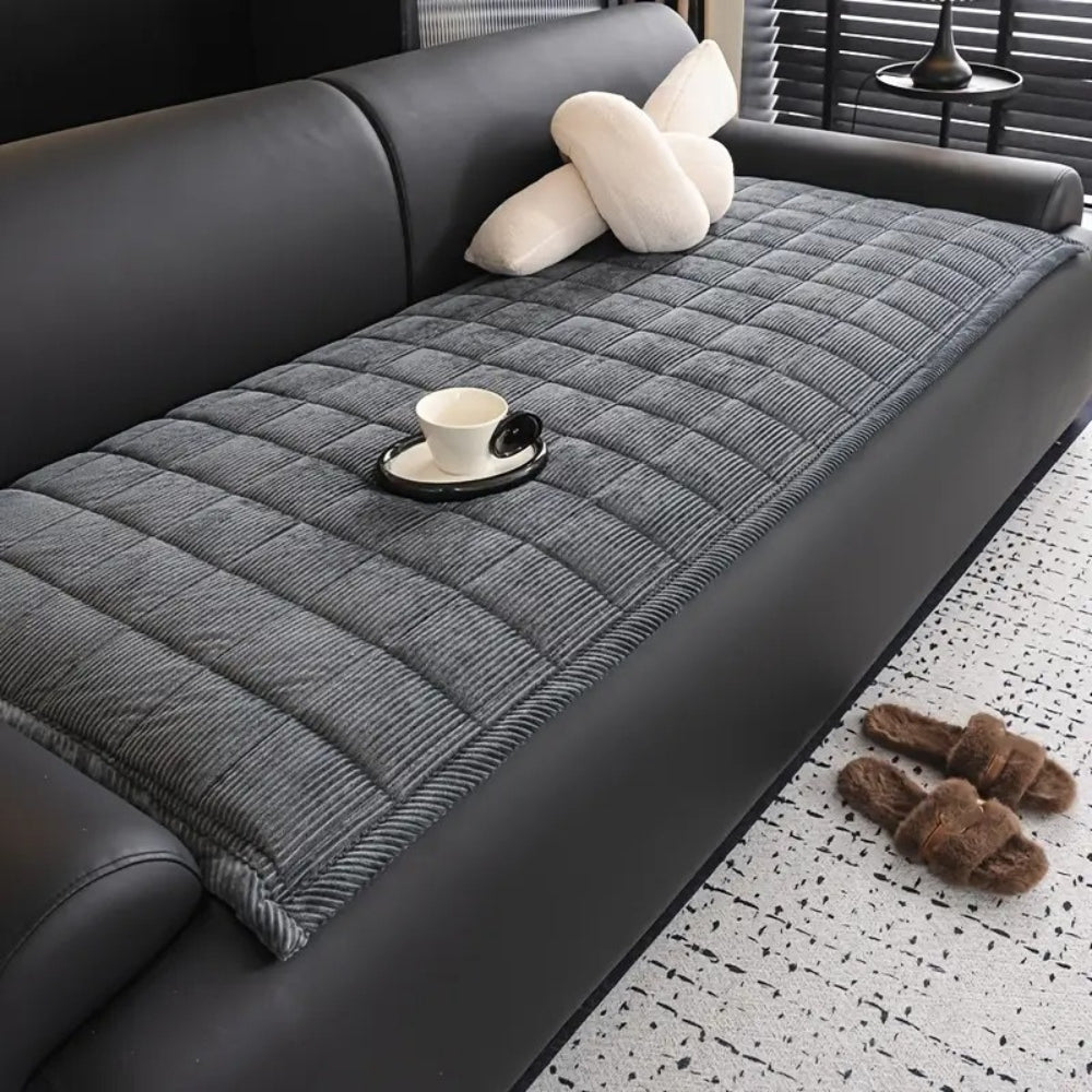 Quilted couch cover with non-slip backing, cozy contemporary texture for sofa protection
