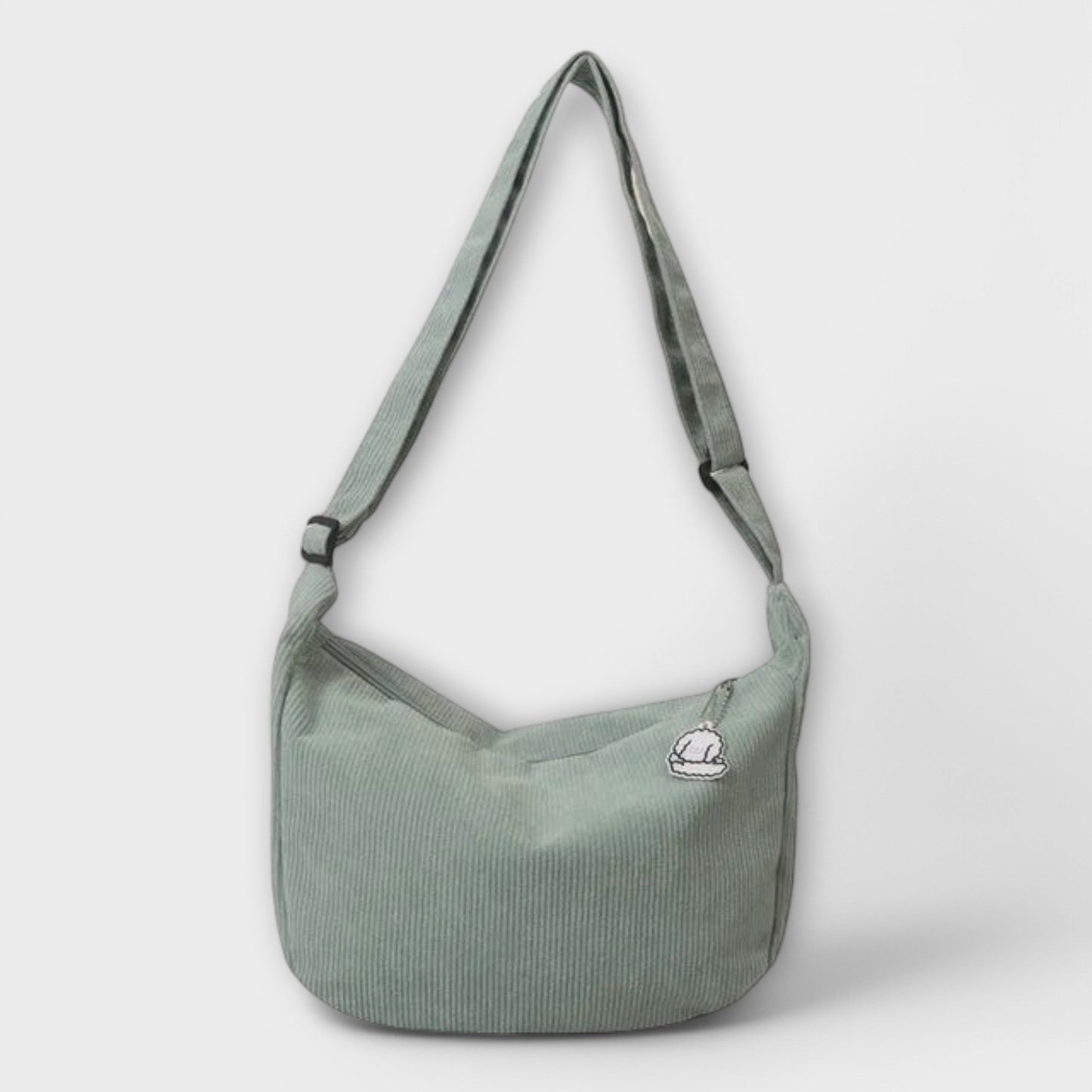 Ingrida structured shoulder bag in elegant silhouette with refined soft shape and functional strap