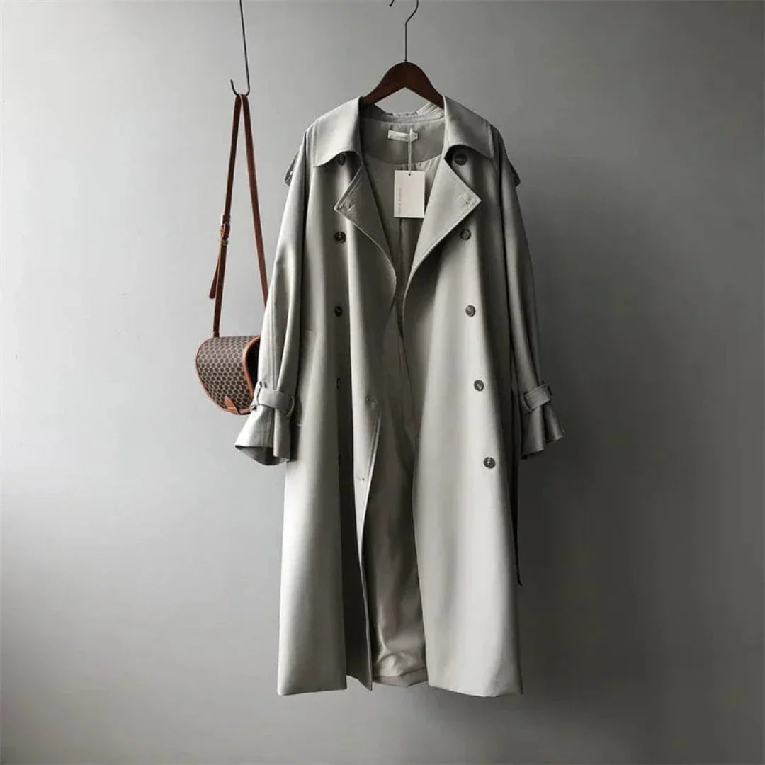 Rafaela beige double-breasted trench coat with adjustable belt, structured shoulders and flowing silhouette