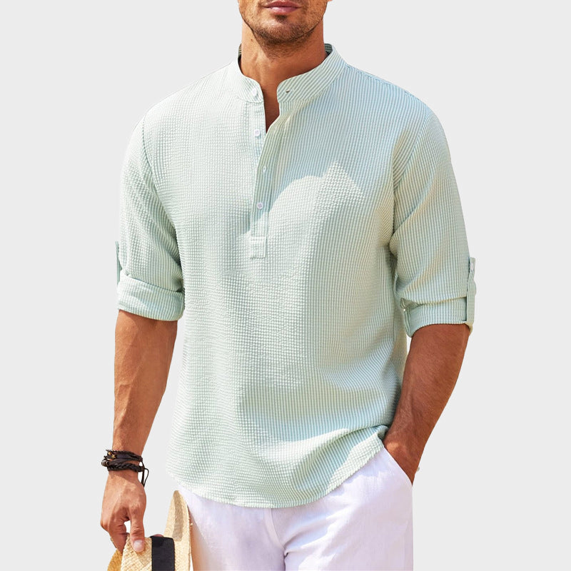 Men's relaxed fit Henley shirt with striped band collar, button placket, and roll tab sleeves