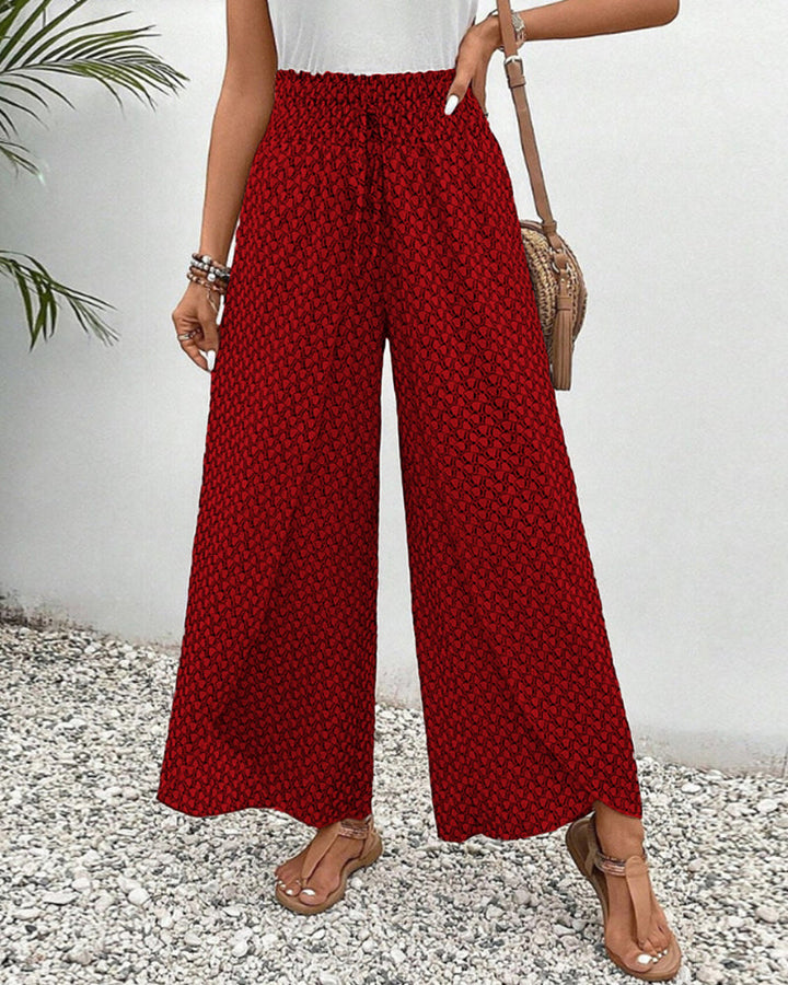 Bold geometric print wide-leg trousers relaxed fit statement fashion pants for day to evening wear