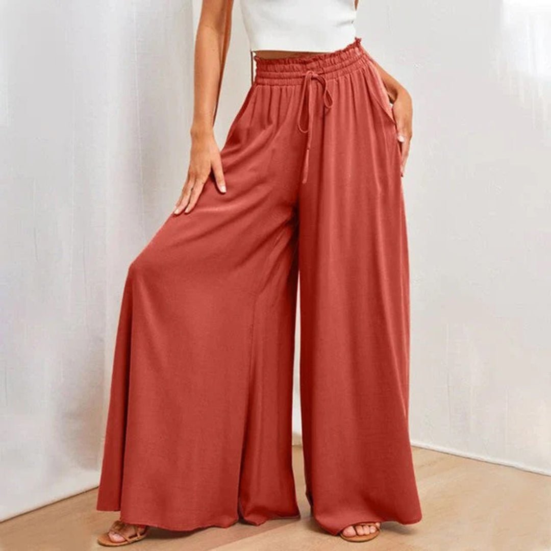Women's terracotta high waist wide leg pants with smocked drawstring waistband and flowy silhouette