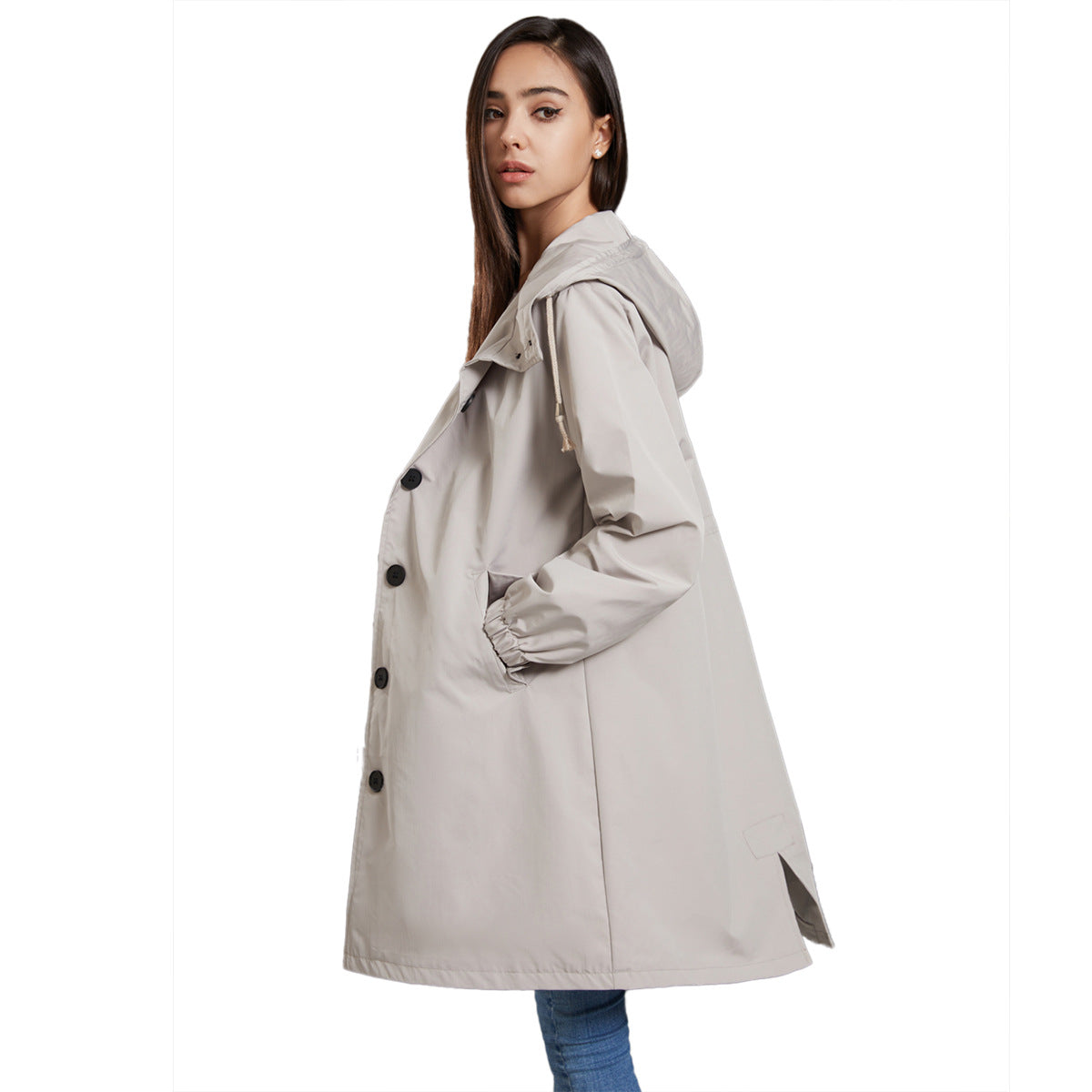 Navy waterproof rain jacket with drawstring hood, button closure, and roomy flap pockets for all-season wear