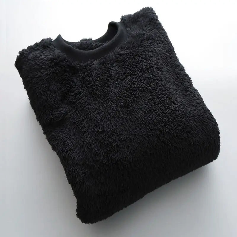 Relaxed fit cream high-pile fleece pullover with soft ribbed crewneck, cozy textured polyester blend