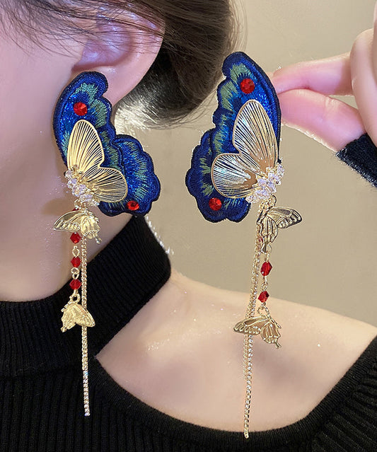 Boucles d'oreilles pendantes rétro en argent sterling bleu, alliage de zircon, tissu brodé de papillons et pompons - Wavlynn
