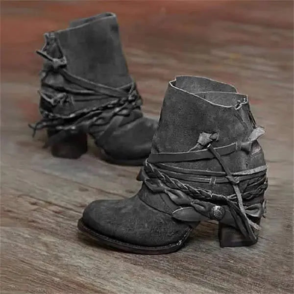Women's tan retro cowboy ankle boots with classic Western silhouette and vintage stitching detail