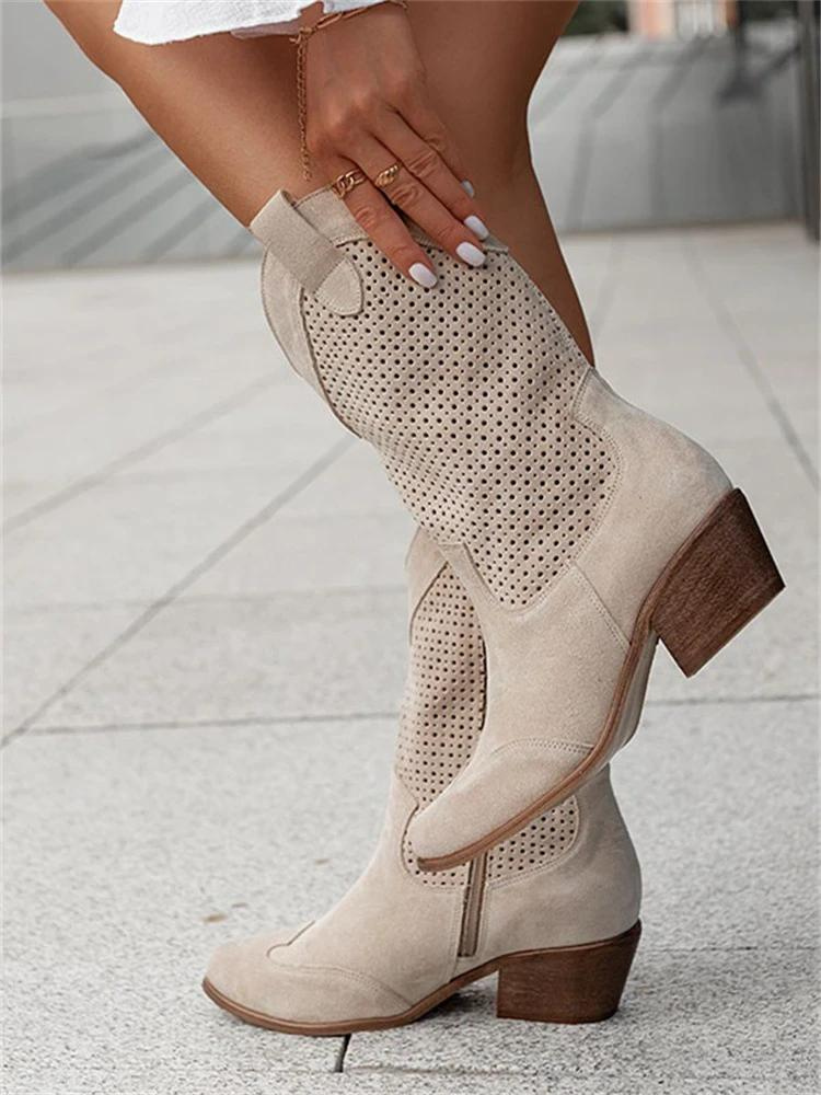 Women's brown perforated suede western boots with breathable shaft detailing and rugged winter silhouette