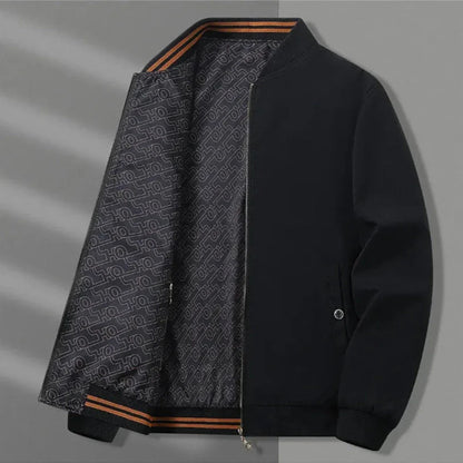 Reversible lightweight jacket solid and patterned dual-sided stand collar elastic cuffs zippered pockets
