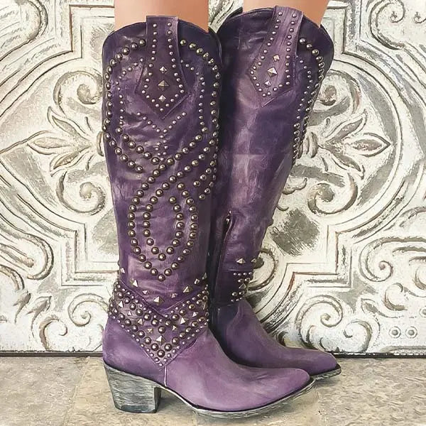 Black long heel boots for women with bold rivet detailing, chic edgy style, available in multiple colors