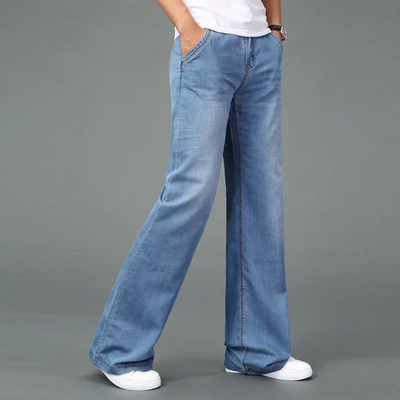 Roberto Russo dark wash bootcut jeans with reinforced stitching and retro-inspired flared silhouette