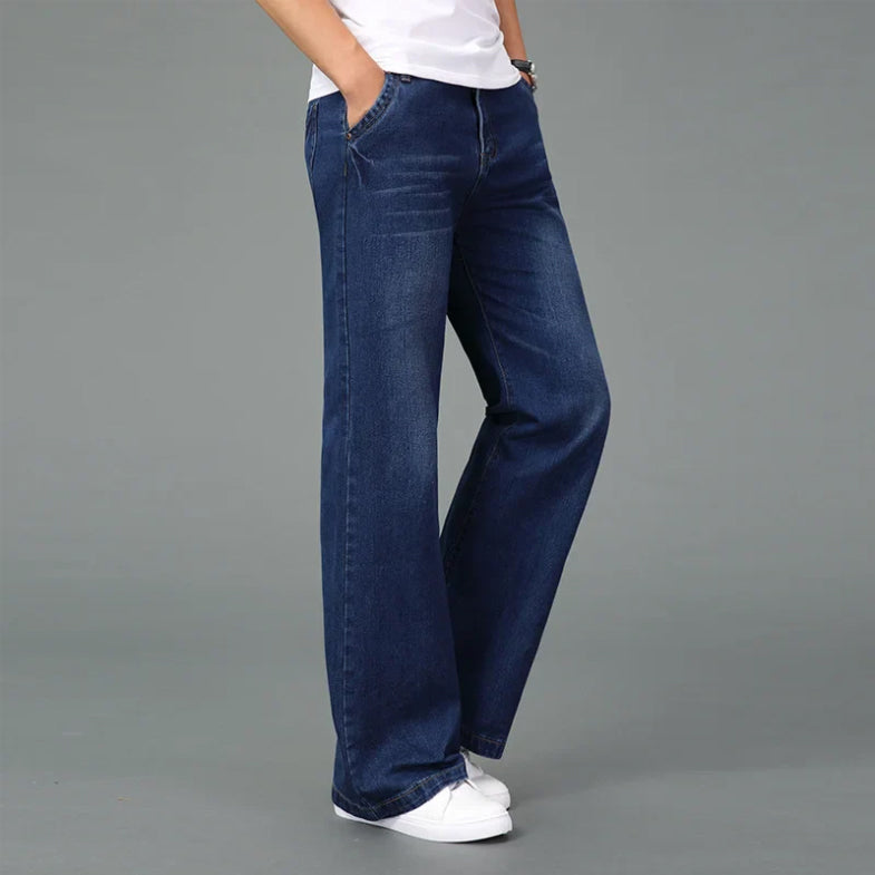 Dark wash premium denim bootcut jeans with relaxed straight fit and reinforced stitching
