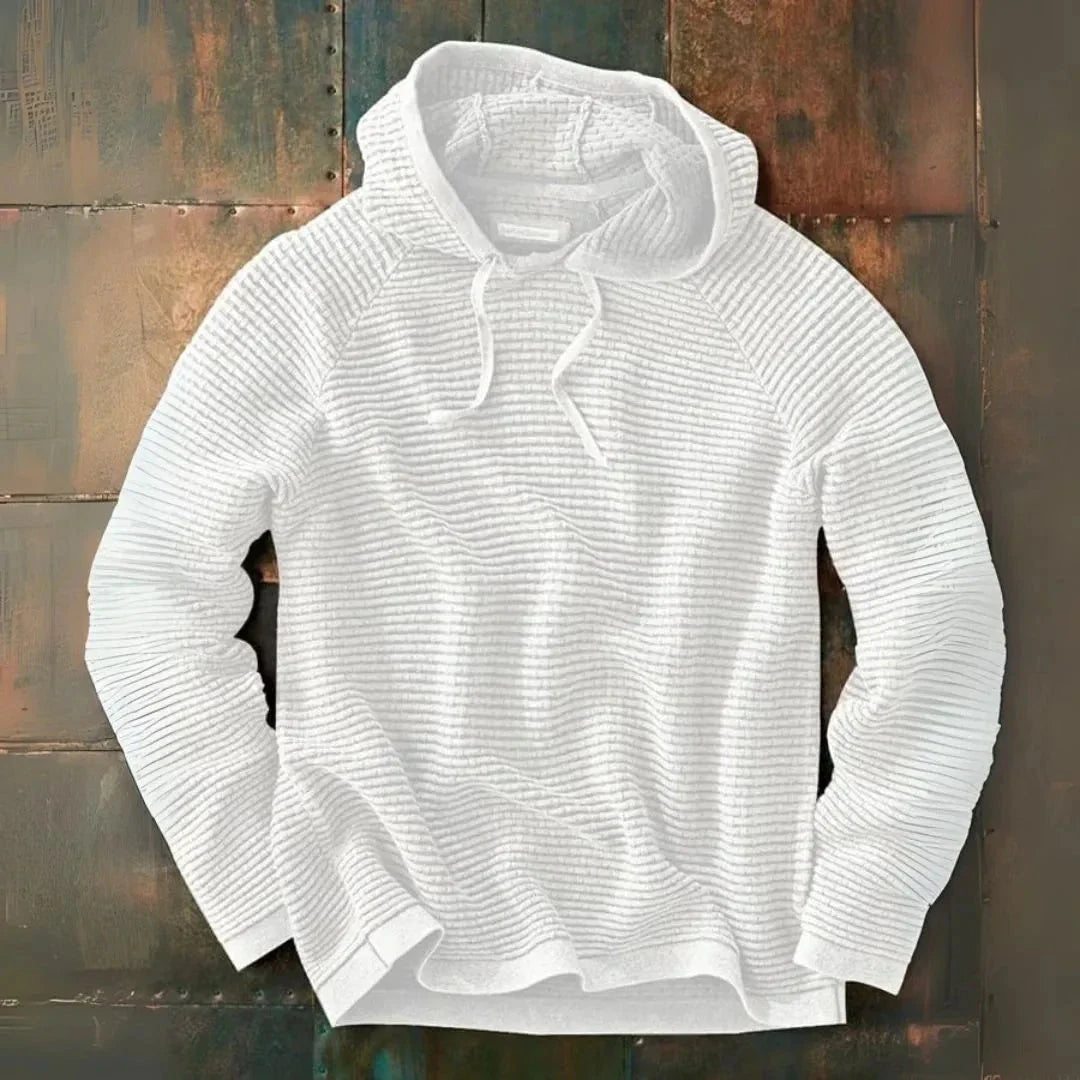 Striped knit hooded pullover in relaxed fit with adjustable drawstrings for casual layering