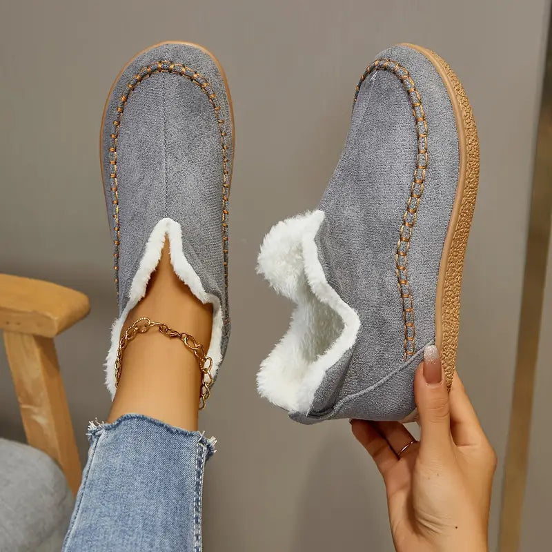 Women's black round toe ankle boots with cozy fleece lining, stylish everyday design for modern comfort