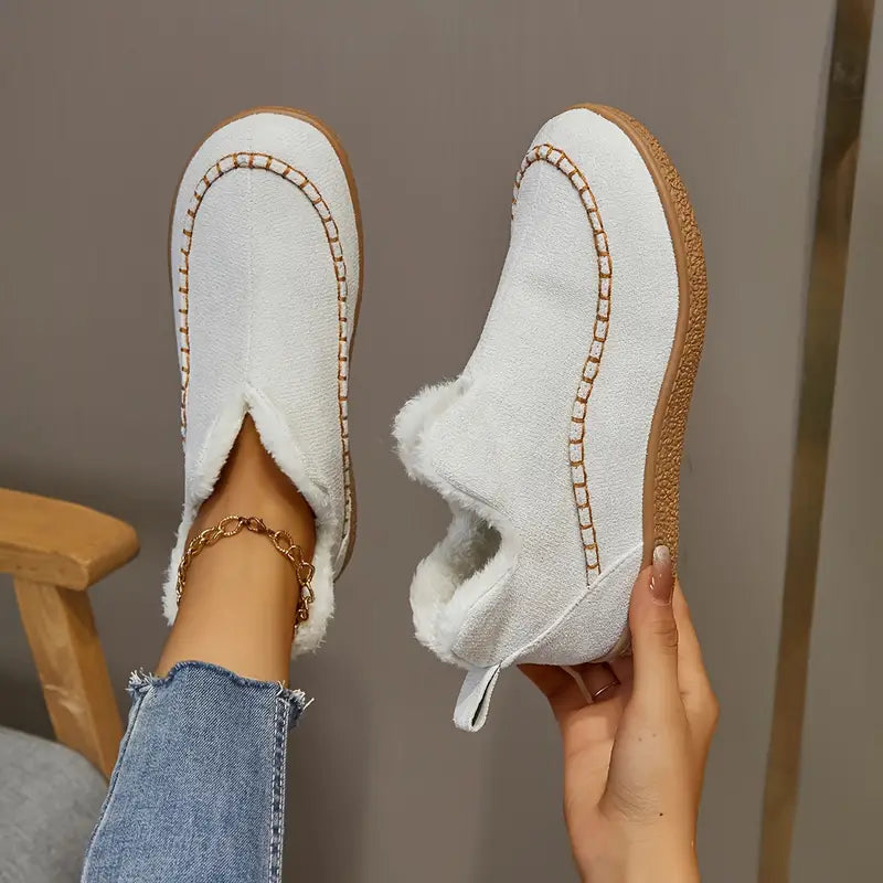 Women's black round toe ankle boots with cozy fleece lining, stylish everyday design for modern comfort
