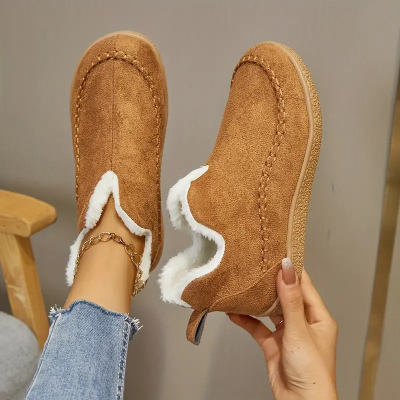 Women's black round toe ankle boots with cozy fleece lining, stylish everyday design for modern comfort