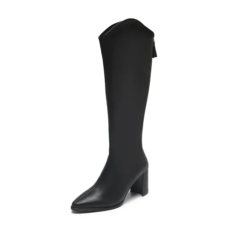 Women's knee-high heeled boots in sleek silhouette with mid-height block heel for polished everyday style