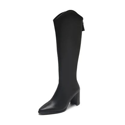 Women's knee-high heeled boots in sleek silhouette with mid-height block heel for polished everyday style