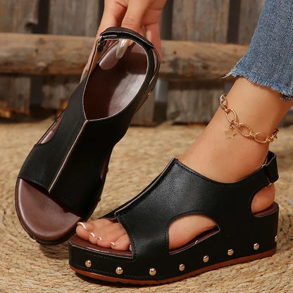 Women's platform cushioned sandals in neutral tone with elevated sole and cushioned footbed