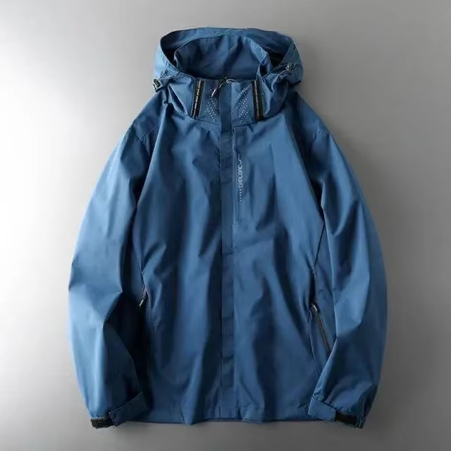 Men's lightweight waterproof windbreaker jacket in neutral tone, packable wind-resistant outdoor travel shell