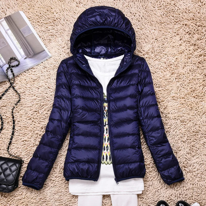 Women's lightweight quilted down jacket tailored fit hip-length with hood, sleek everyday outerwear