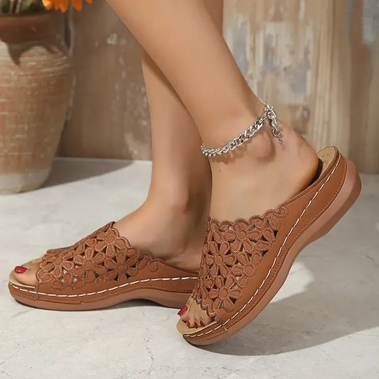 Women's floral comfort sandals with cushioned insole and delicate flower accent detailing