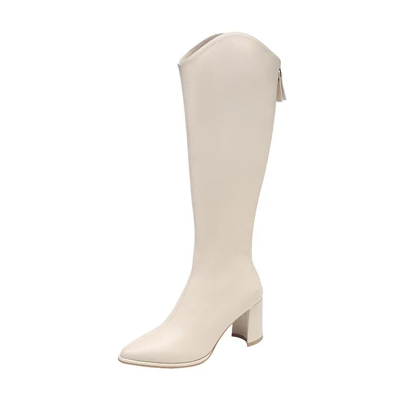 Women's knee-high heeled boots in sleek silhouette with mid-height block heel for polished everyday style