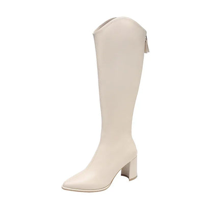 Women's knee-high heeled boots in sleek silhouette with mid-height block heel for polished everyday style