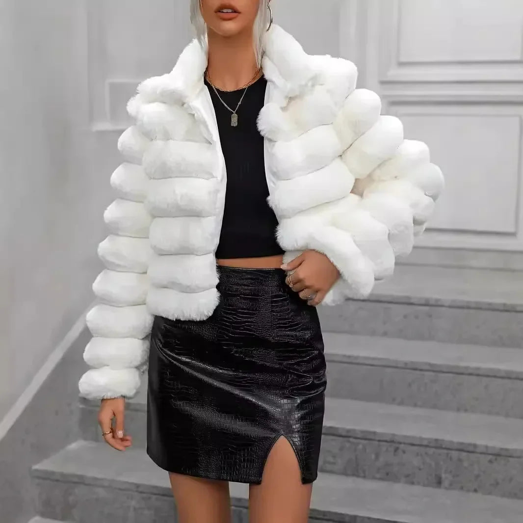 Ivory short faux fur coat with plush texture, modern silhouette, luxurious everyday winterwear