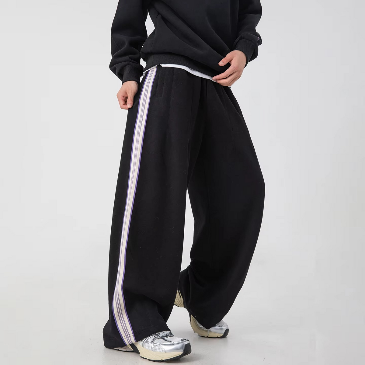 Men's loose fit sweatpants with side stripe stitch design, elastic waist, athletic casual style