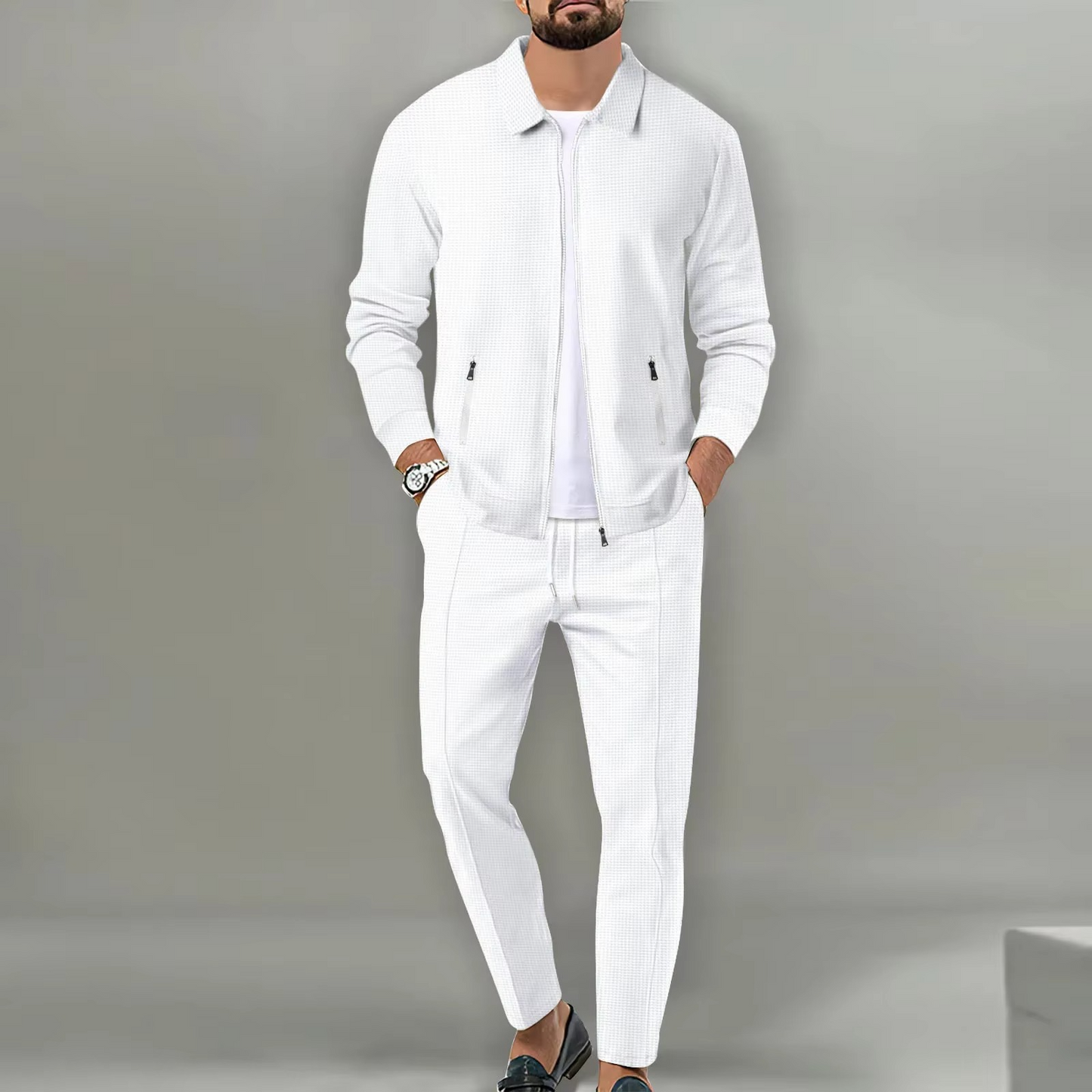 Men's two-piece polo jacket shirt and matching drawstring pants set in coordinated everyday comfort style