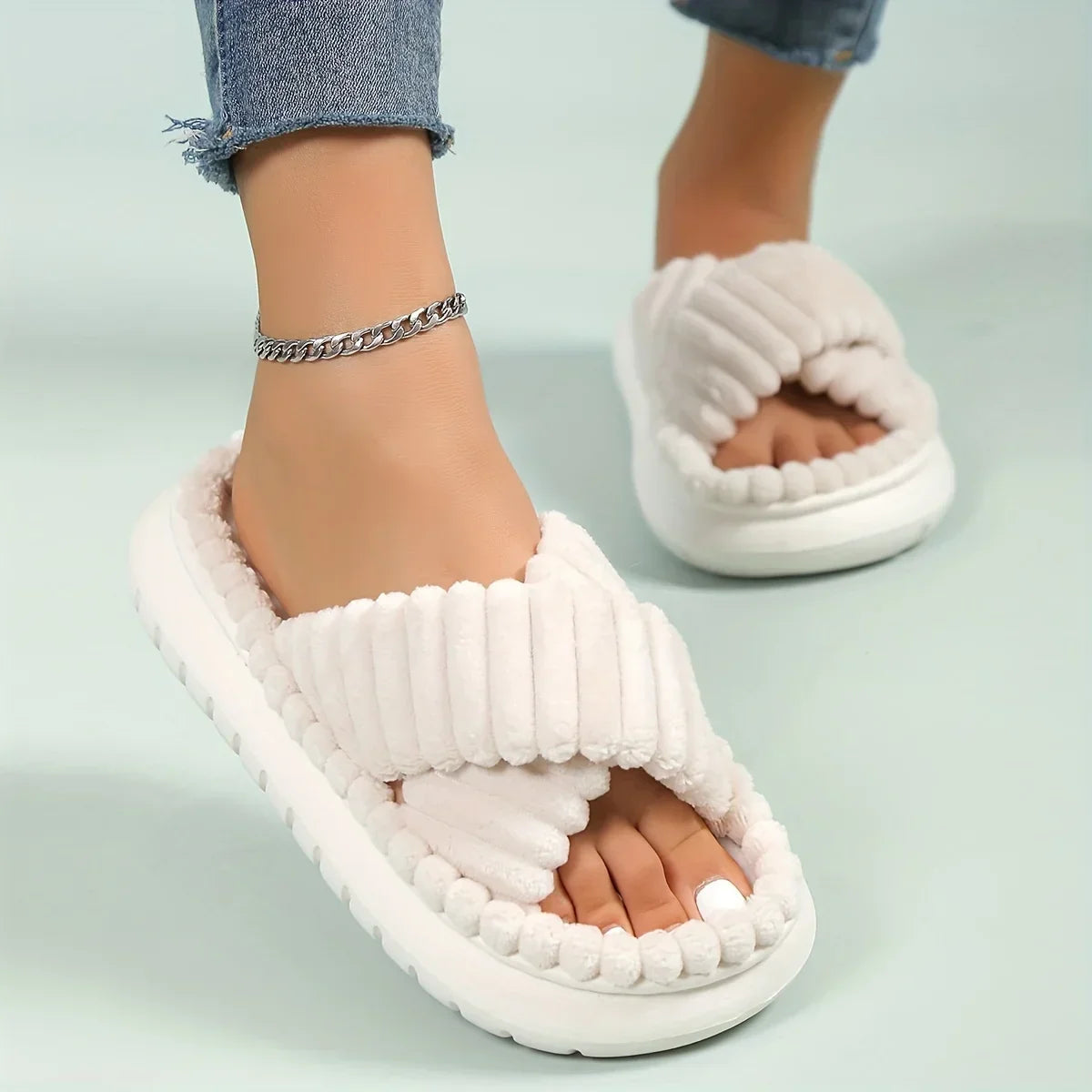 Women's plush cross-band slide slippers in cozy style with ultra-soft textured straps