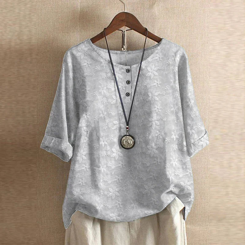 Vintage floral blouse relaxed fit retro-inspired design with classic botanical print