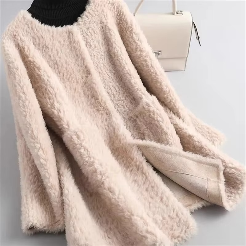 Women's mid-length plush faux lamb fur coat in cozy cardigan style with soft textured finish