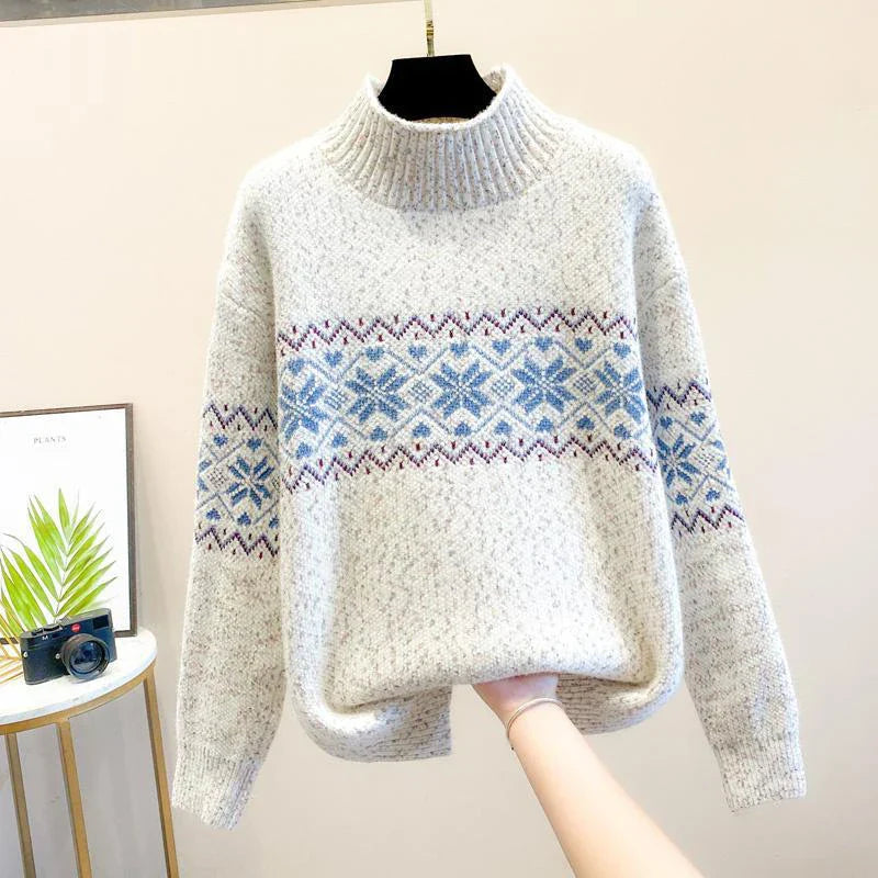 White relaxed-fit turtleneck knit sweater with intricate snowflake pattern for women